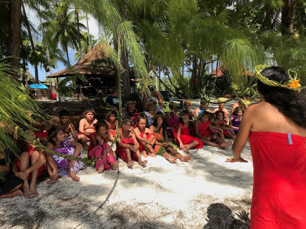 Students learning outdoors near the ocean
