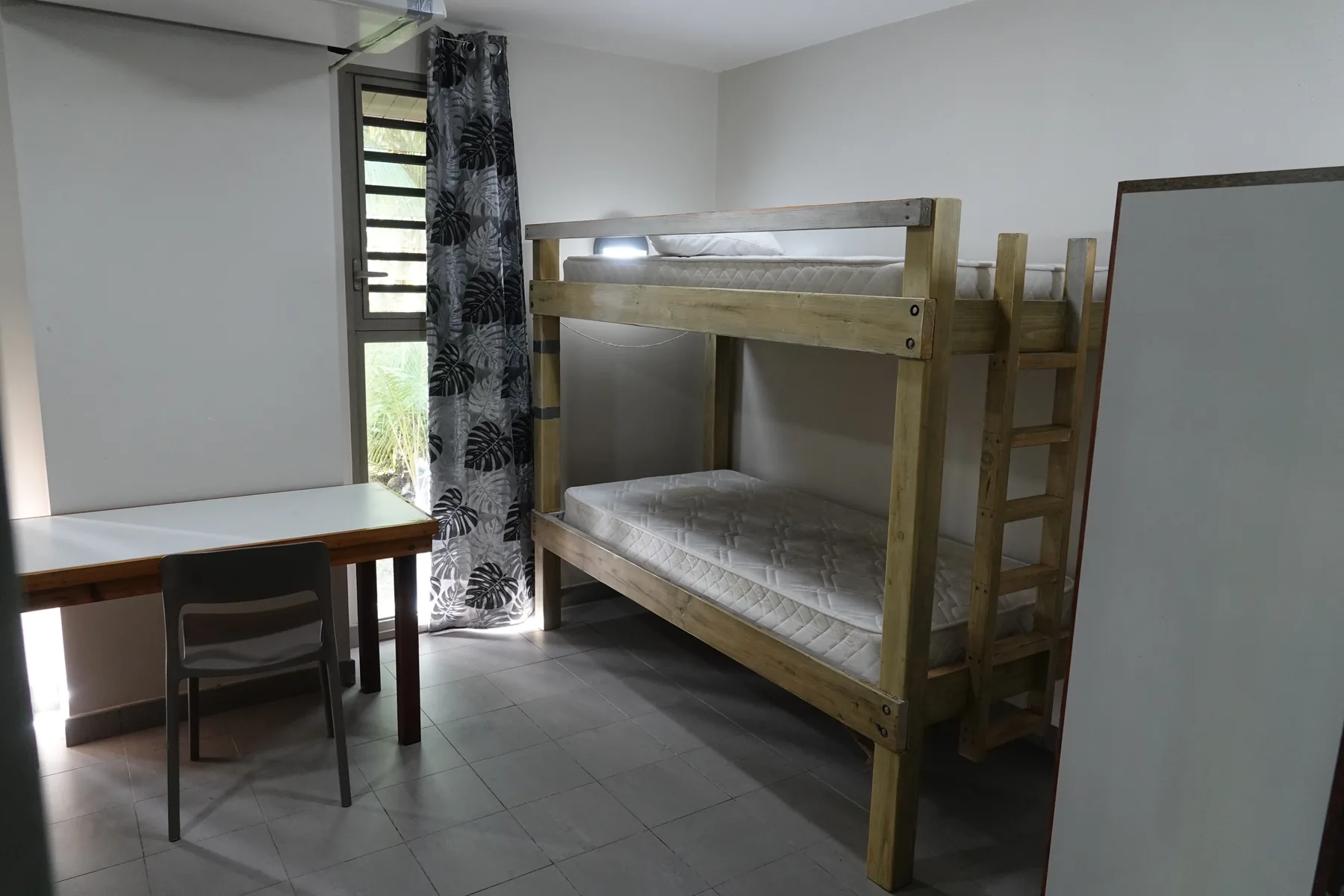 Beds in a Bailey Field Station bedroom