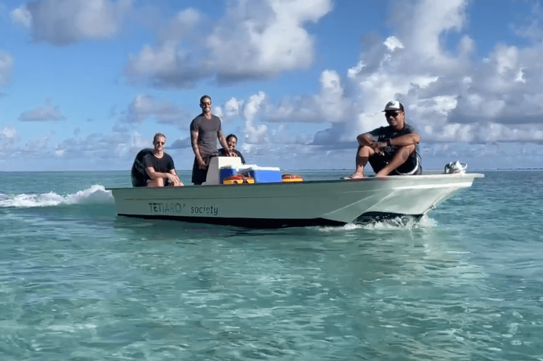 Tetiaroa Society rangers travelling across the lagoon in a work boat