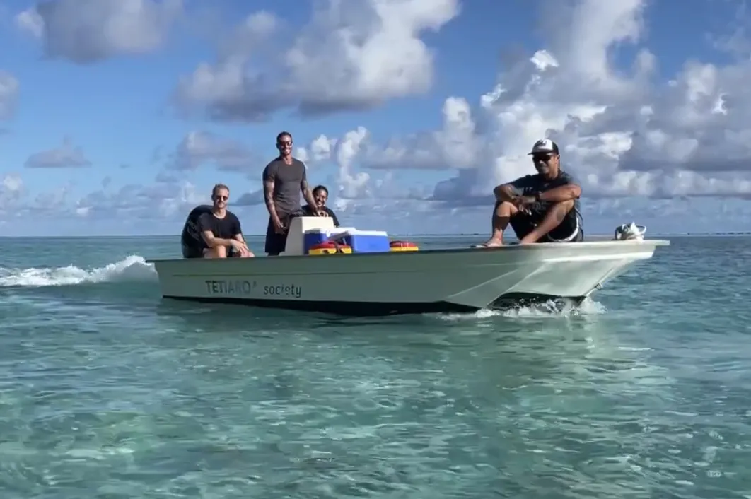 Field team aboard a boat on Tetiaroa's lagoon